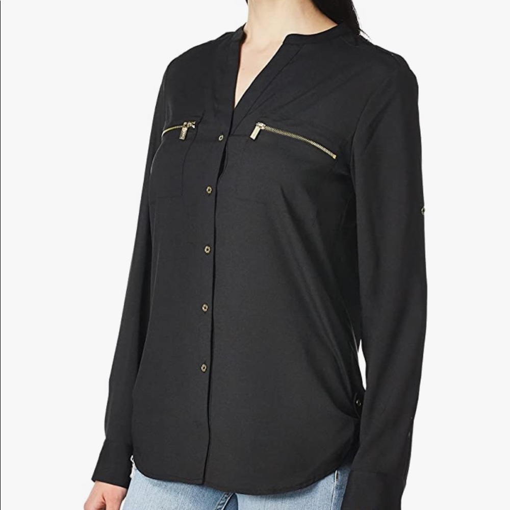 Calvin Klein, black with gold buttons and zipper’s. Size S